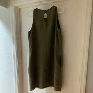 Tommy Bahama linen dress with cotton lining.  Two pockets, fringed hem, sage